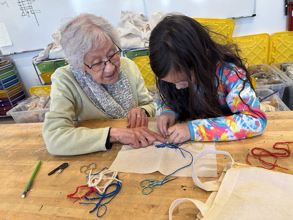 Patsy Garcia teaching colcha embroidery at Mountain Valley School